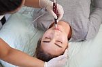 Professional Permanent Makeup Applying Stock Photo