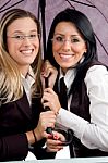 Professional Women Holding Umbrella Stock Photo