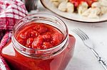 Pureed Tomatoes In A Glass Jar Stock Photo