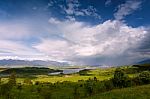 Rainbow After Rain. Spring Rain And Storm In Mountains Stock Photo