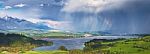 Rainbow And Storm In The Mountains In Canada Stock Photo