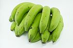 Raw Banana On White Background Stock Photo