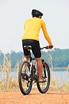 Rear View Of Young Bicycle Man Wearing Rider Suit And Safety Hel Stock Photo