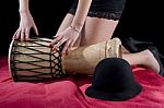 Red Bed And Djembe Stock Photo