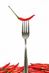 Red Chili Pepper On Fork Stock Photo