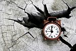 Red Clock On Old Cut Wooden Stock Photo