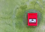 Red Fire Alarm Stock Photo