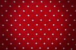 Red Knit With Polka Dot Background Stock Photo