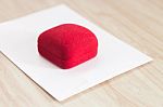 Red Ring Box On Wooden Background Stock Photo