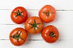 Red Tomatoes Fruits Isolated On White Stock Photo