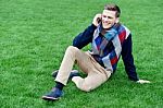 Relaxed Young Fashion Guy On Call Stock Photo