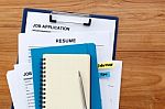 Resume And Job Application With Blank Notebook Stock Photo