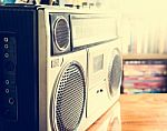 Retro Radio Cassette Stereo Recorder On Wooden Desk Stock Photo