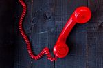 Retro Vintage Red Landline Unhang On Wooden Background Stock Photo