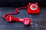 Retro Vintage Red Landline Unhang On Wooden Background Stock Photo