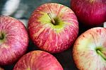 Ripe Red Apples On Wooden Background Stock Photo