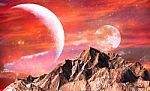 Rock Mountain With Red Sky And Twin Moons As Background Stock Photo