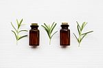 Rosemary Essential Oil On White Stock Photo