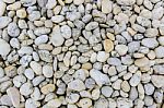 Rounded Stones White And Gray On Beach As Background Stock Photo