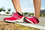 Runner Feet Preparing For Running On Road Closeup On Shoe Stock Photo