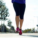 Runner Feet Running On Road Closeup On Shoe Stock Photo