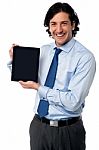 Sales Manager Displaying Newly Launched Tablet Pc Stock Photo