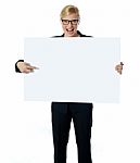 Saleswoman Pointing At Billboard Stock Photo