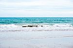 Sand Beach With Blue Ocean Stock Photo