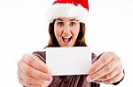 Santa Hat Woman Holding Card Stock Photo