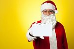 Santa Holding Blank White Placard Stock Photo