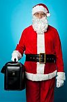 Santa Holding Brand New Briefcase Stock Photo