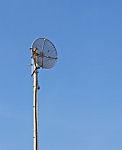 Satellite Dish On Pole Stock Photo