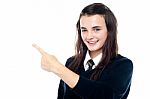 Schoolgirl Showing Pointing Upwards Stock Photo