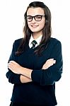 Schoolgirl With Crossed Arms Stock Photo