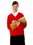 Schoolgirl Writing Stock Photo