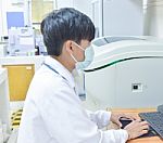 Scientist With Equipment And Science Experiments Stock Photo