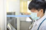 Scientist With Equipment And Science Experiments In White Tone Stock Photo