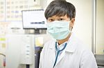 Scientist With Equipment And Science Experiments In White Tone Stock Photo