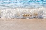 Sea Wave Splashing On The Beach Stock Photo