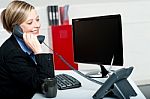 Secretary Answering Bosses Call Stock Photo