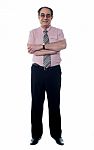 Senior Businessman Arm Crossed Stock Photo