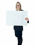 Senior Businesswoman Holding Board Stock Photo