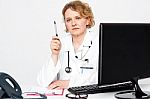 Senior Doctor Holding Pen Stock Photo