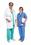 Senior Doctors Holding Clipboard Stock Photo