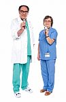 Senior Doctors Holding Stethoscope Stock Photo