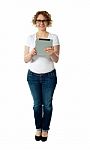 Senior Woman Holding Tablet Pc Stock Photo