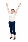 Senior Woman Lifting Her Arms Up Stock Photo