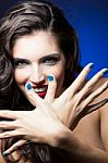 Sexy Beauty Girl With Red Lips And Blue Nails Stock Photo