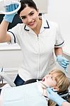 She Is In Annual Dental Check Up Stock Photo