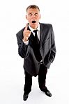 Shocked Businessman Pointing Up Stock Photo